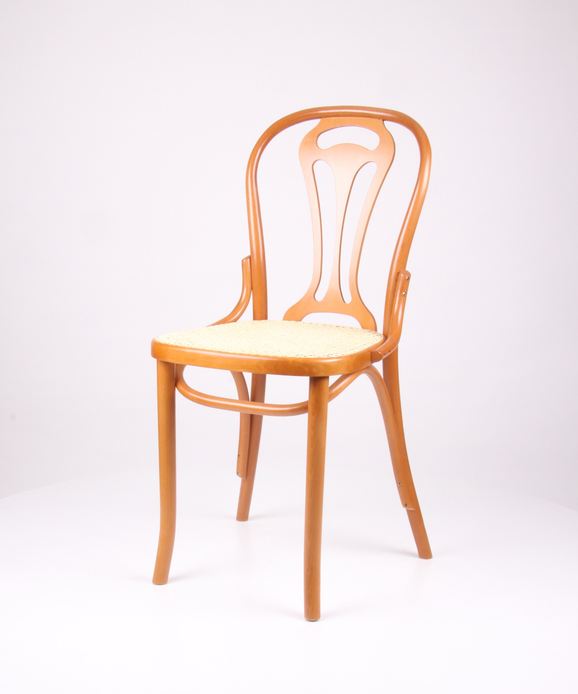 Bugholzstuhl mit Tulpenmotiv-R�cken und Geflecht-Sitz, honig � n121